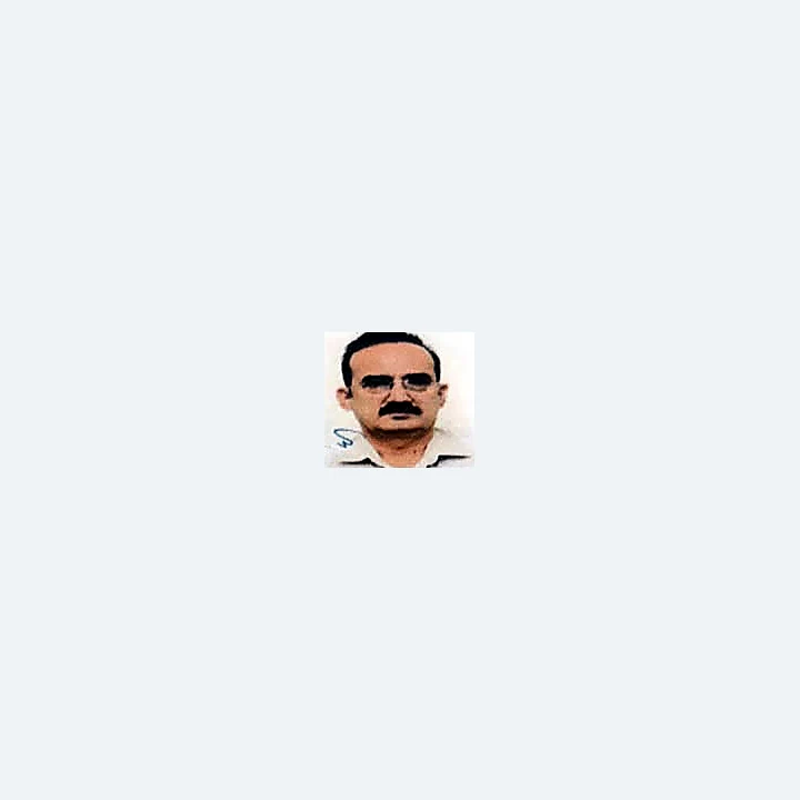 Portrait of Dr. Ashok K. Sharma, Vice President of the Jammu Ophthalmological Society